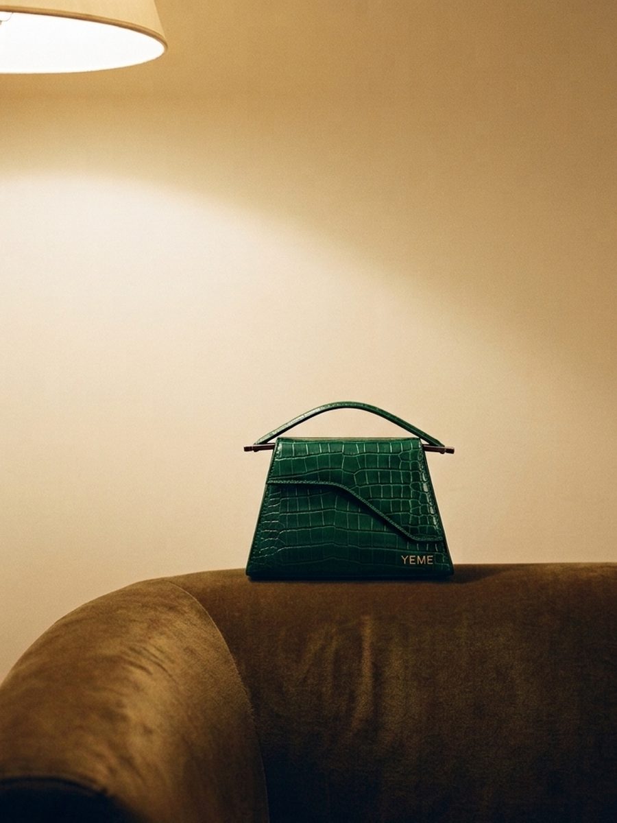 Fold top-handle bag in deep green