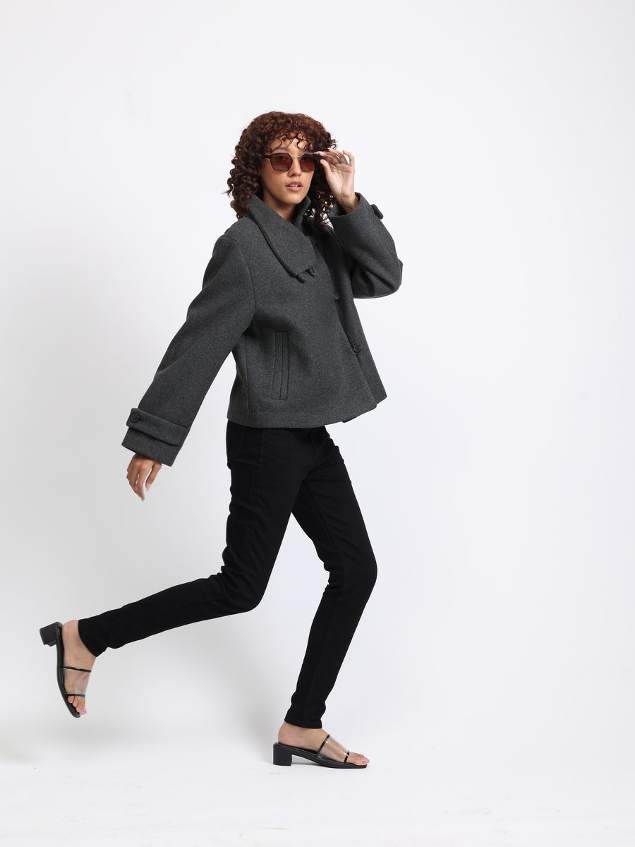Model wearing Venom sunglasses with brown lenses